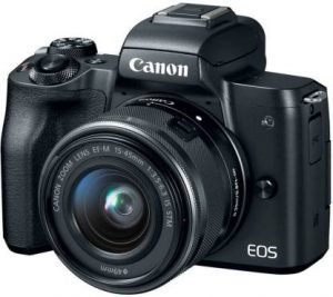 Canon EOS camera with 15-45mm lens for high-quality photography, perfect for amateurs and professionals.