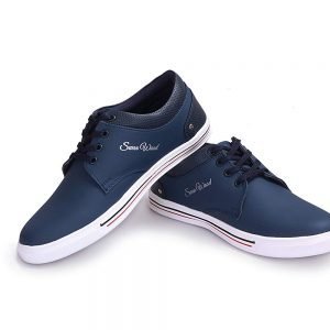 Men's navy blue casual sneakers with white soles and stylish branding, ideal for online sales and discounts.