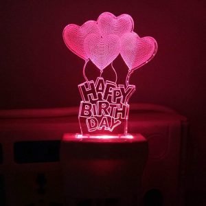 Neon birthday decoration sign with pink hearts and "Happy Birthday" message, perfect for celebration parties and festive settings.