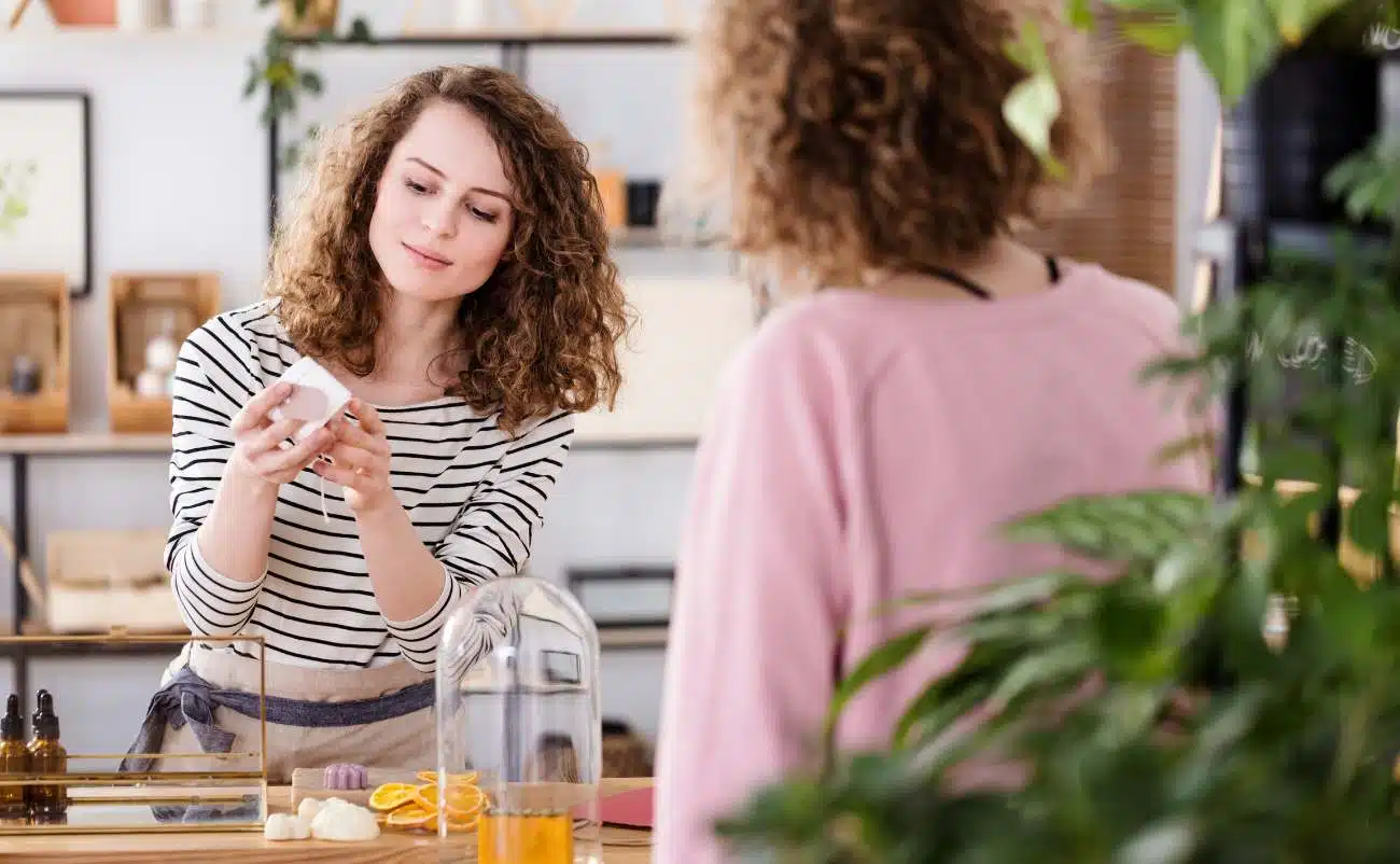 Vegan skincare products display at a sale event, showcasing natural and eco-friendly beauty options, perfect for health-conscious consumers seeking sustainable skincare deals.