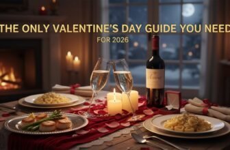 Romantic dinner scene with wine, pasta, candles, and rose petals, perfect for Valentine's Day 2026. Elegant table setting for a cozy, intimate celebration.